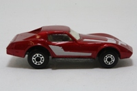 Matchbox/Lesney 62f; Chevrolet Corvette; Metallic Ruby Red, White Seats, Unpainted Base, Clear Windows, White Tampo On The Bonnet And Side
